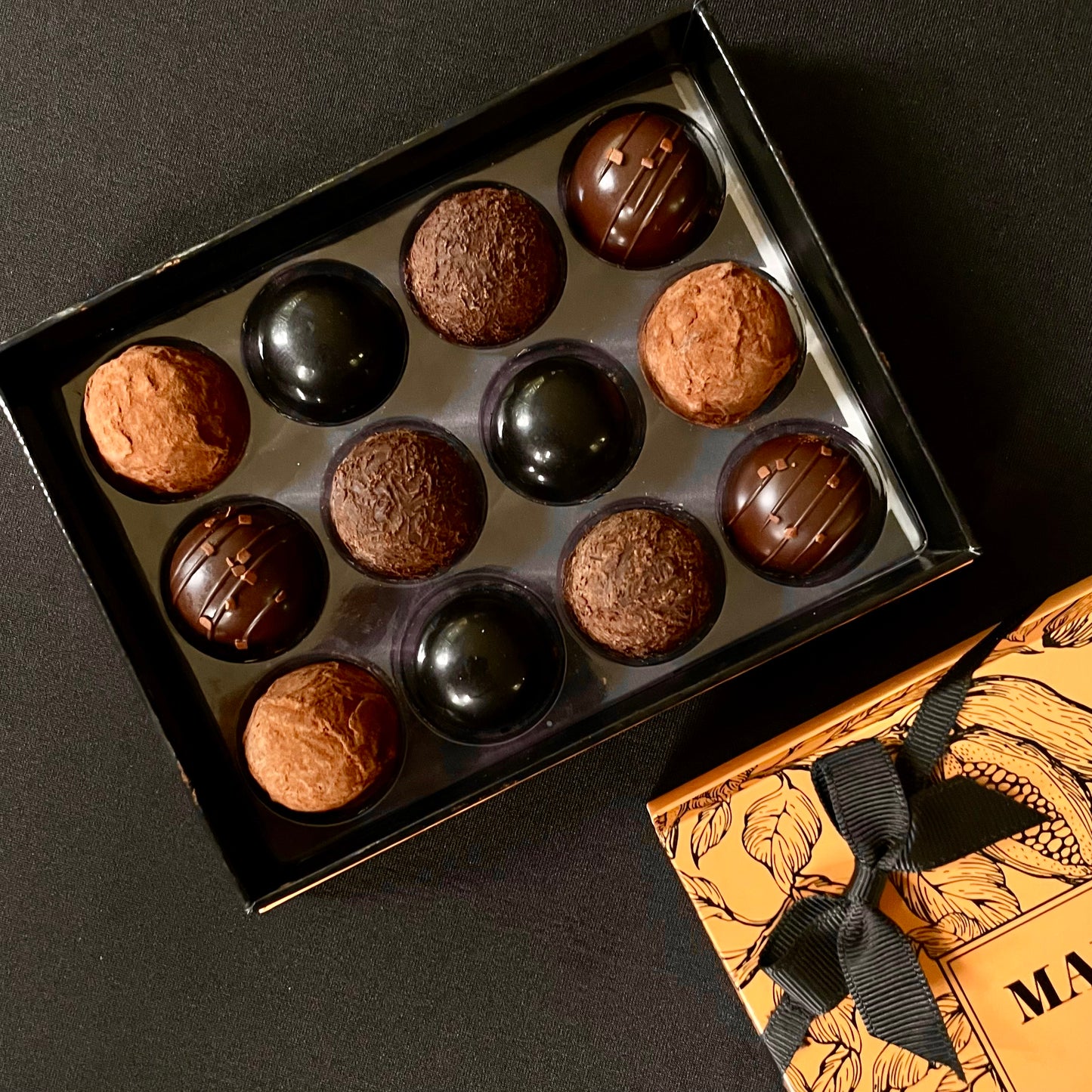 "Exclusive Noir" 64% Dark chocolate Collection.