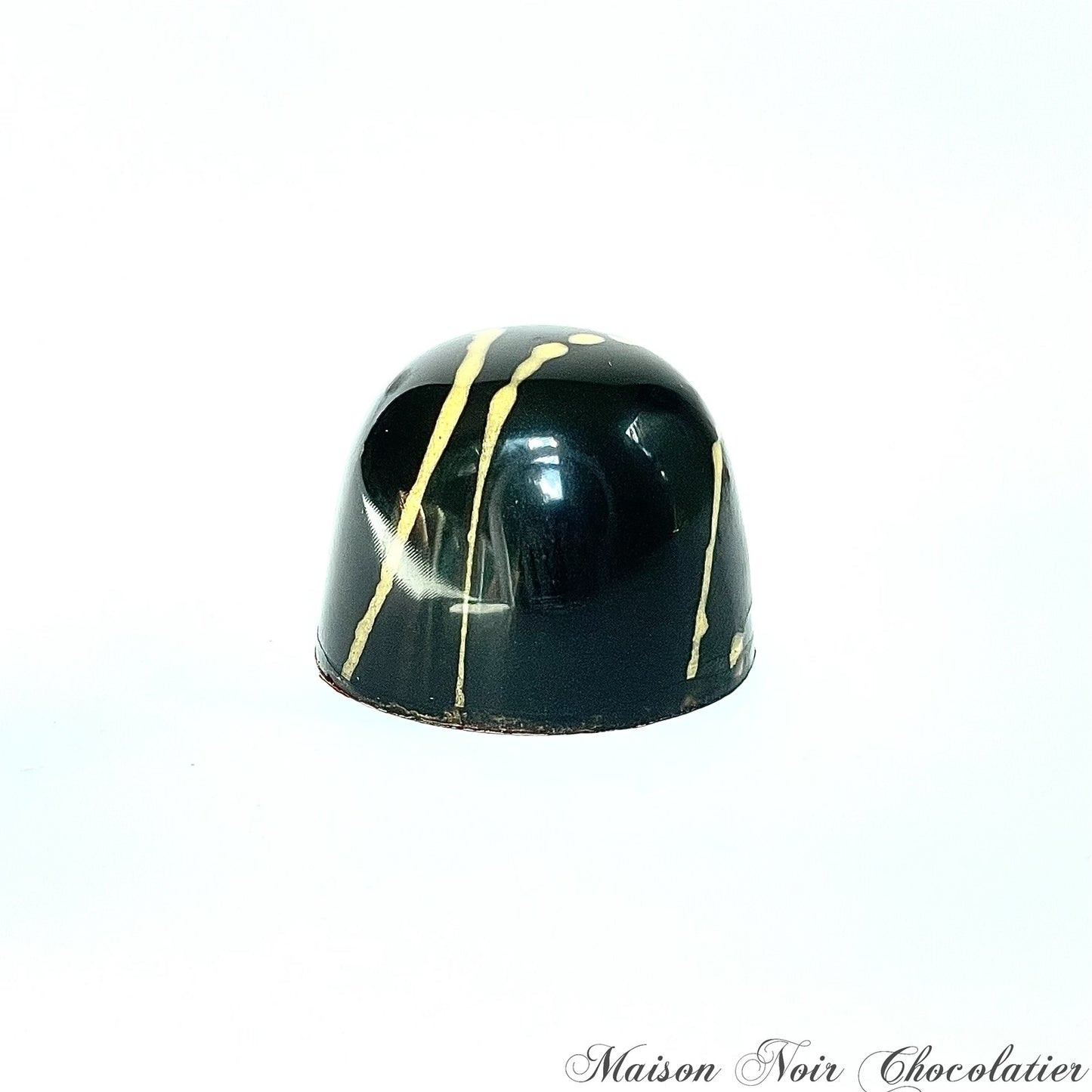 Seasonal availability only! Fall Collection 64% Dark chocolate Bonbons.