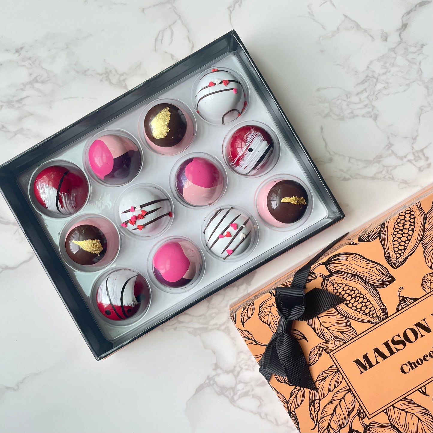Seasonal availability only! "Chic and sexy XOXO" 64% Dark chocolate Bonbon collection.