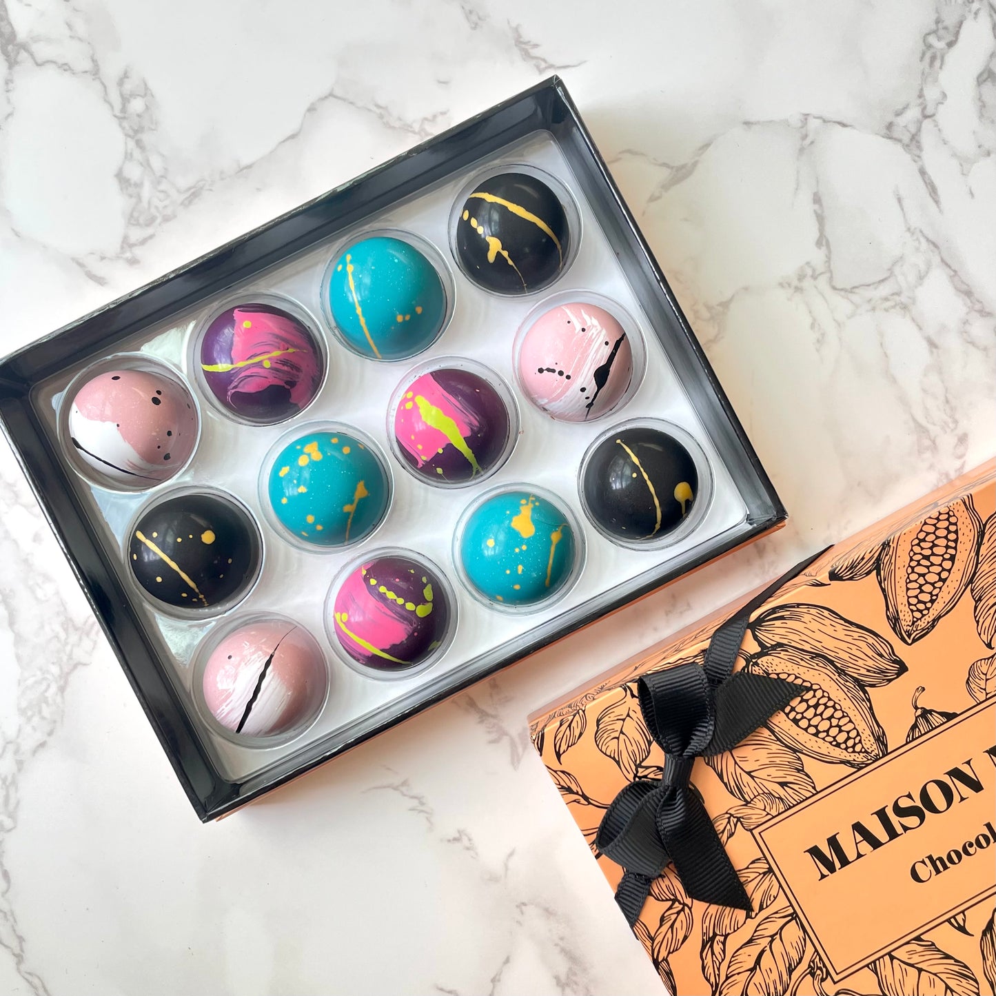 Seasonal availability only! Fall Collection 64% Dark chocolate Bonbons.